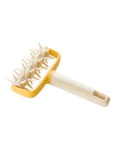 Rodillo punteador delicia